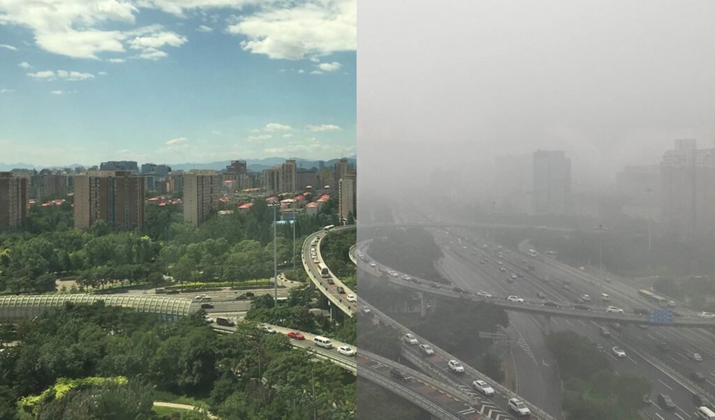 City skyline covered in dense smog, with reduced visibility and gray skies.